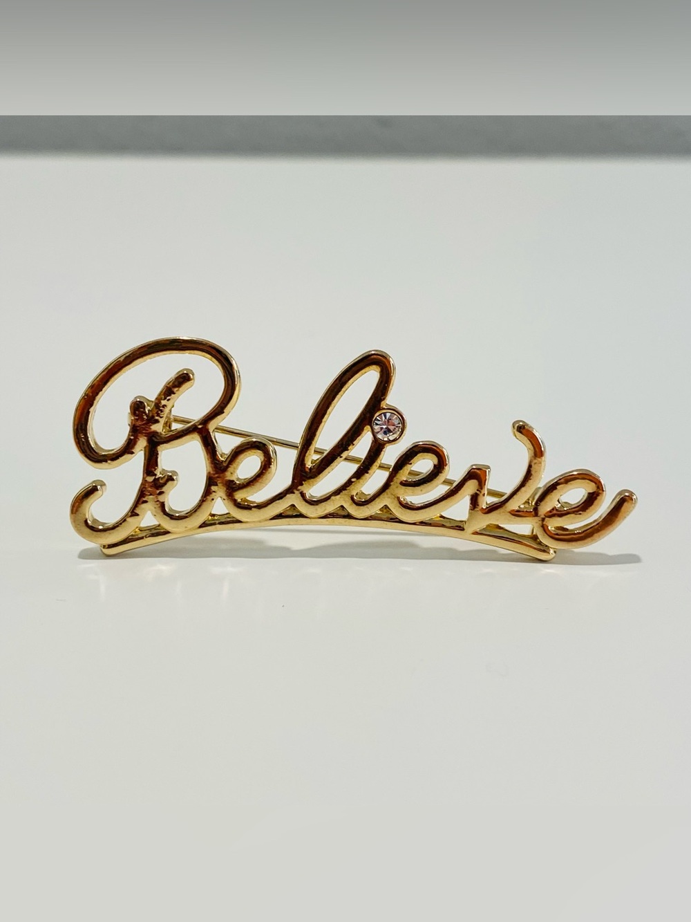 Vintage BELIEVE Christmas Crystal Brooch Gold Tone Holiday Pin Cursive Avon
